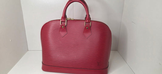 Louis Vuitton Alma PM en excellent état