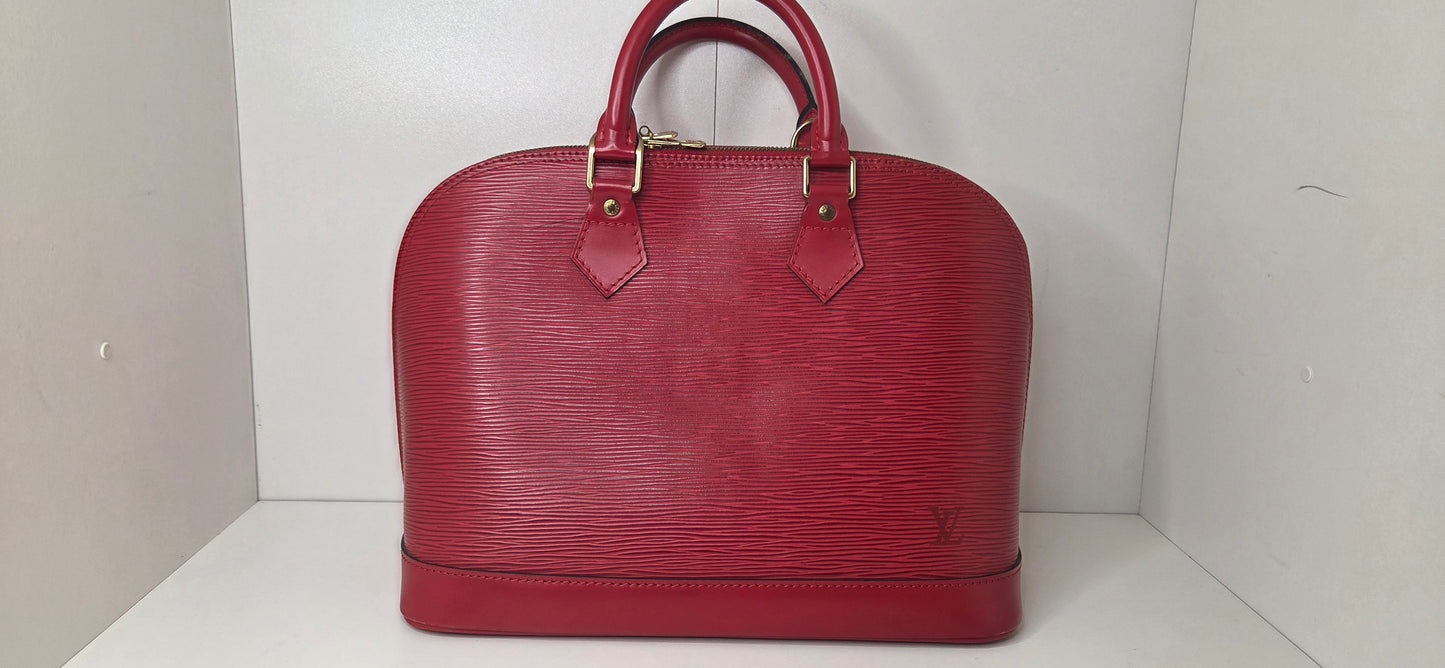 Louis Vuitton Alma PM en excellent état