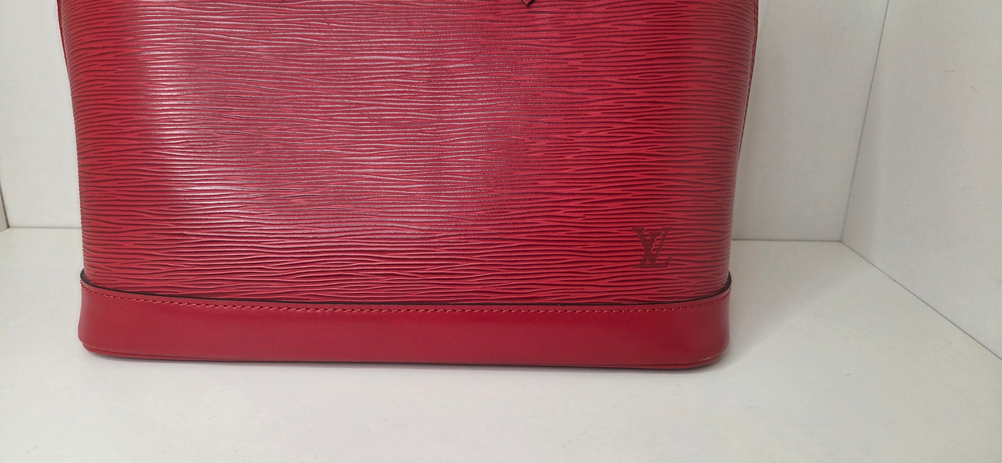 Louis Vuitton Alma PM en excellent état