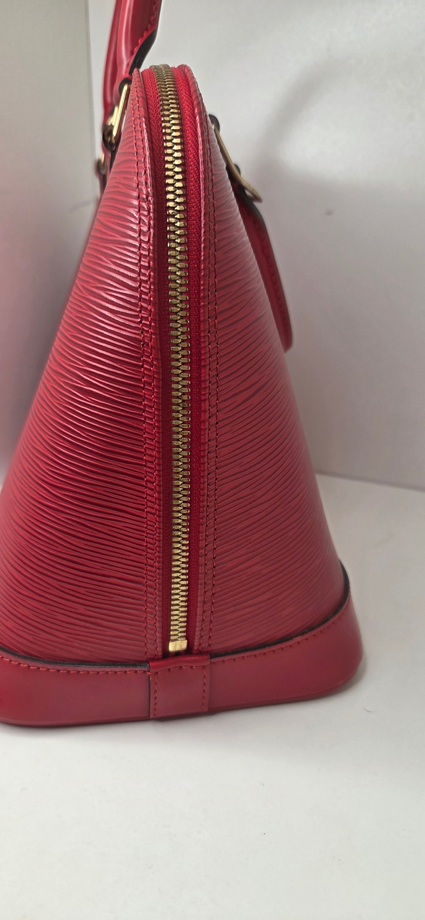 Louis Vuitton Alma PM en excellent état