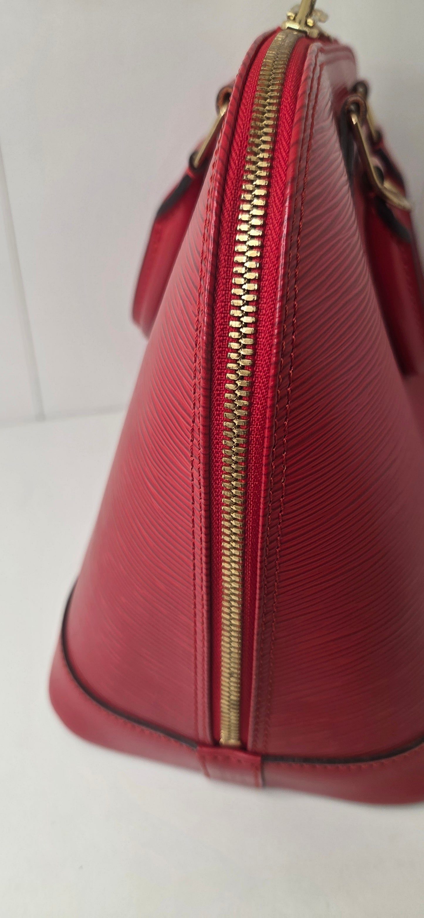 Louis Vuitton Alma PM en excellent état