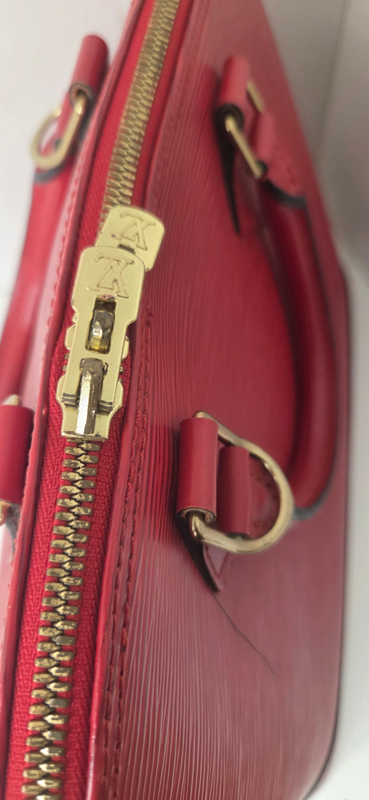 Louis Vuitton Alma PM en excellent état