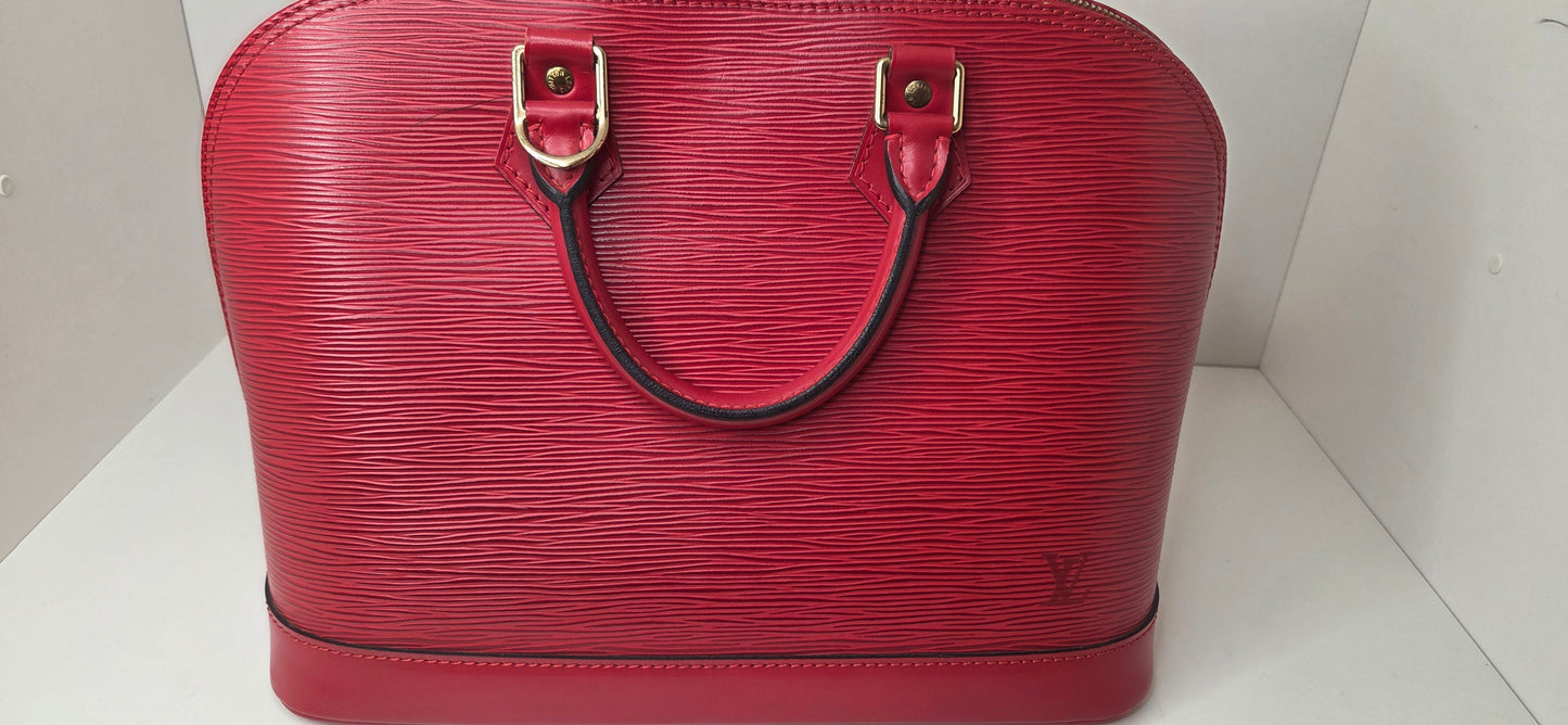 Louis Vuitton Alma PM en excellent état