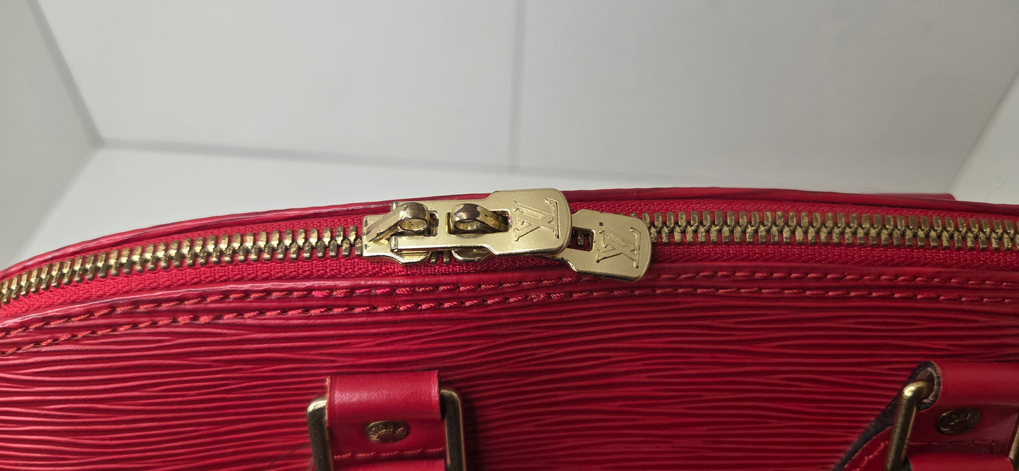 Louis Vuitton Alma PM en excellent état
