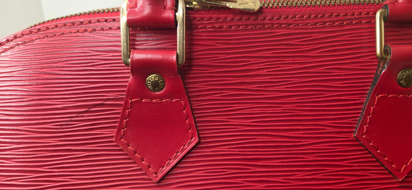 Louis Vuitton Alma PM en excellent état