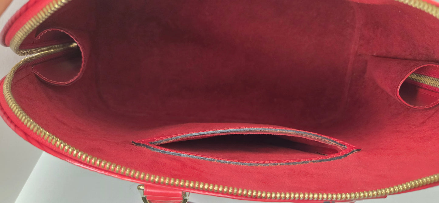 Louis Vuitton Alma PM en excellent état