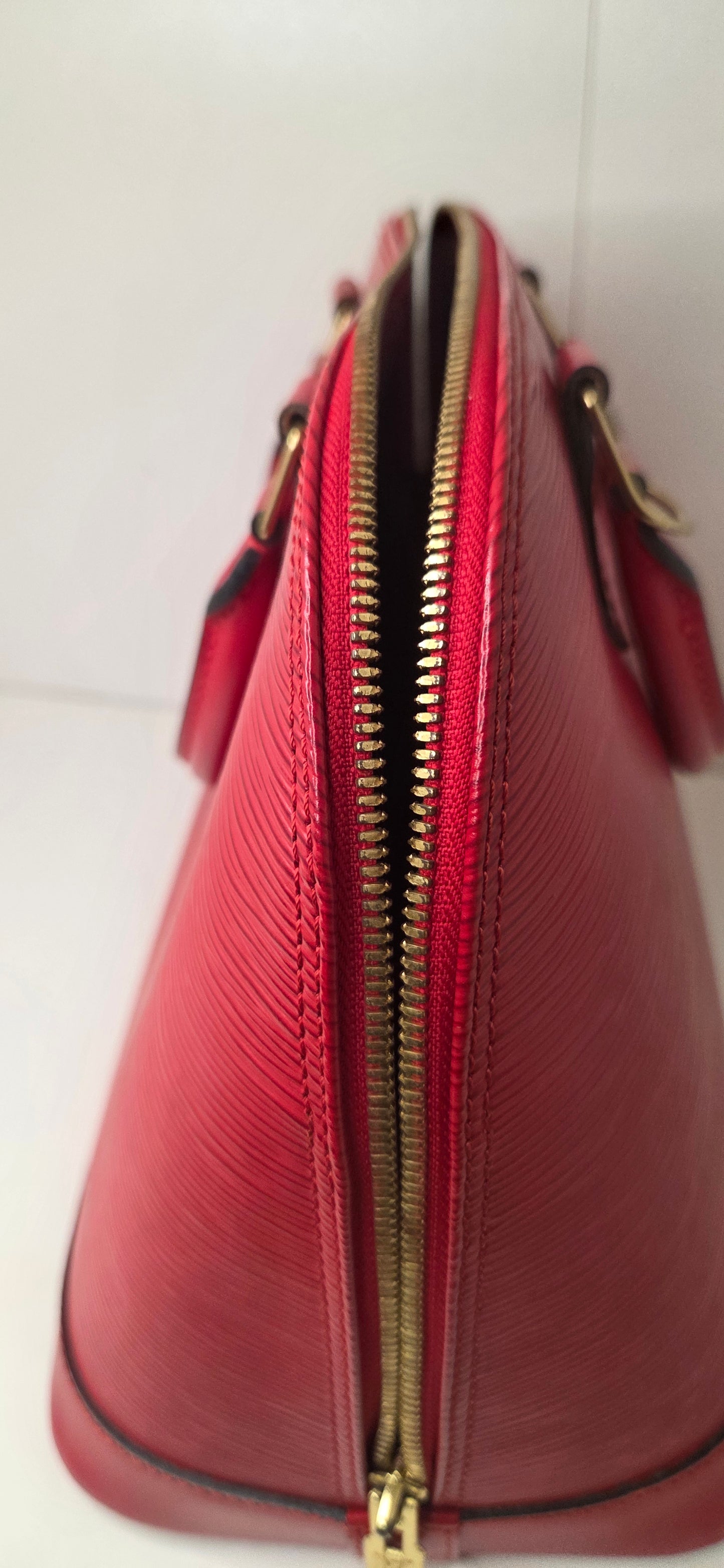 Louis Vuitton Alma PM en excellent état