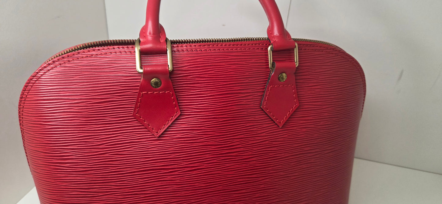Louis Vuitton Alma PM en excellent état