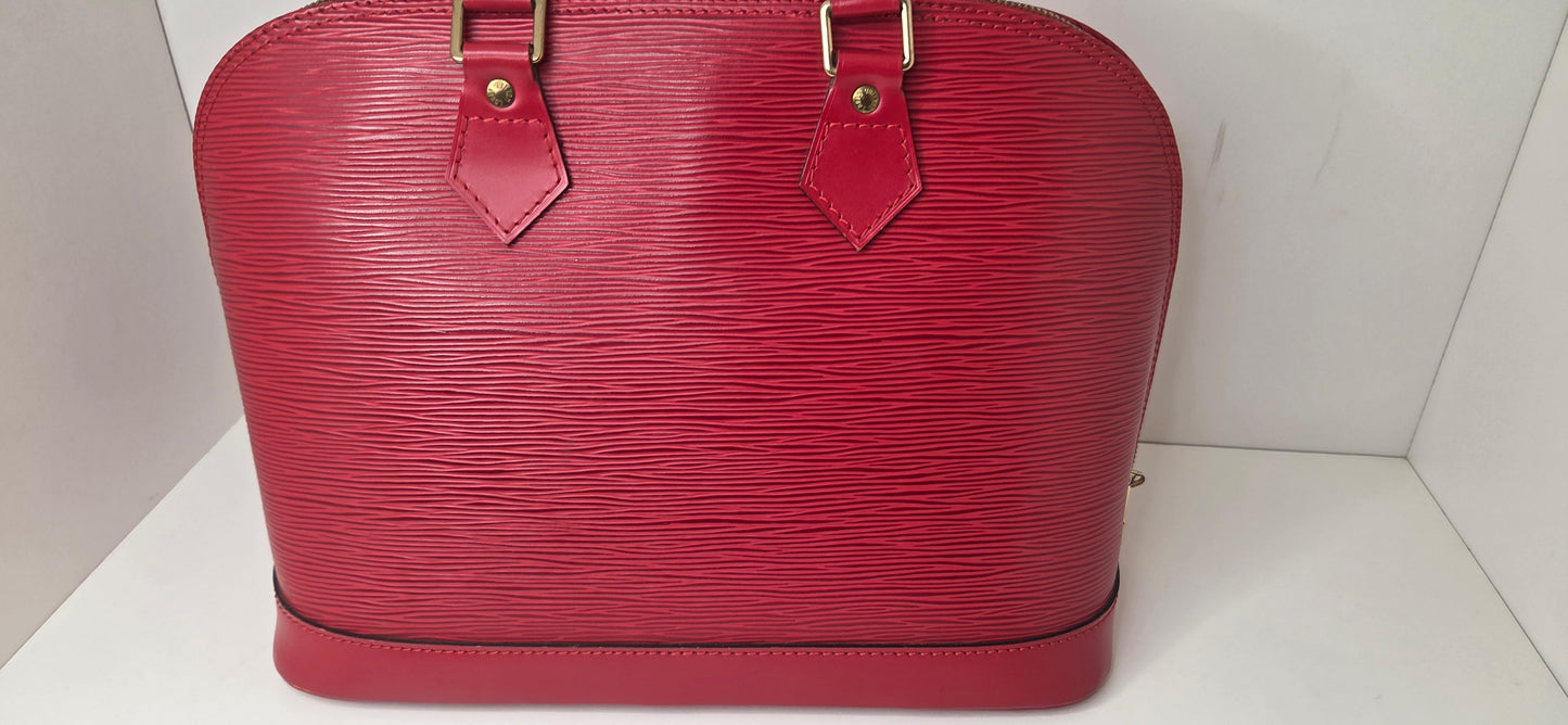 Louis Vuitton Alma PM en excellent état