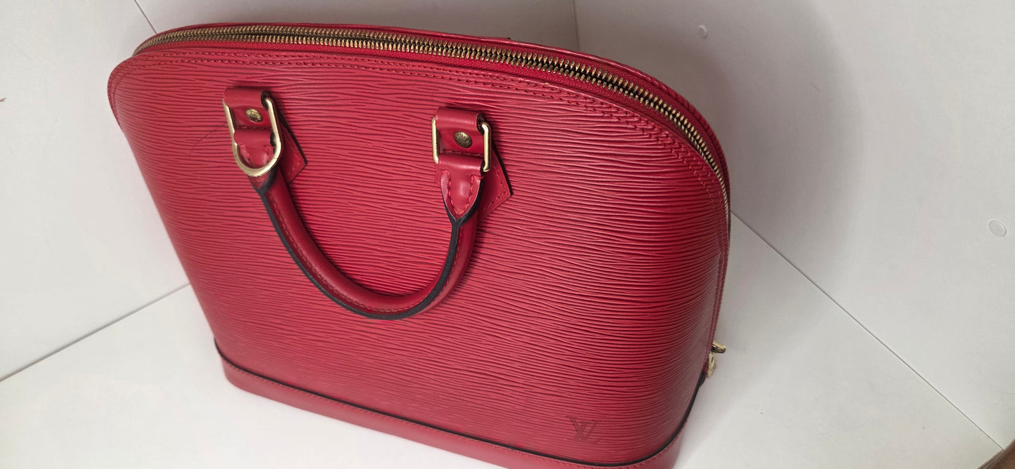 Louis Vuitton Alma PM en excellent état