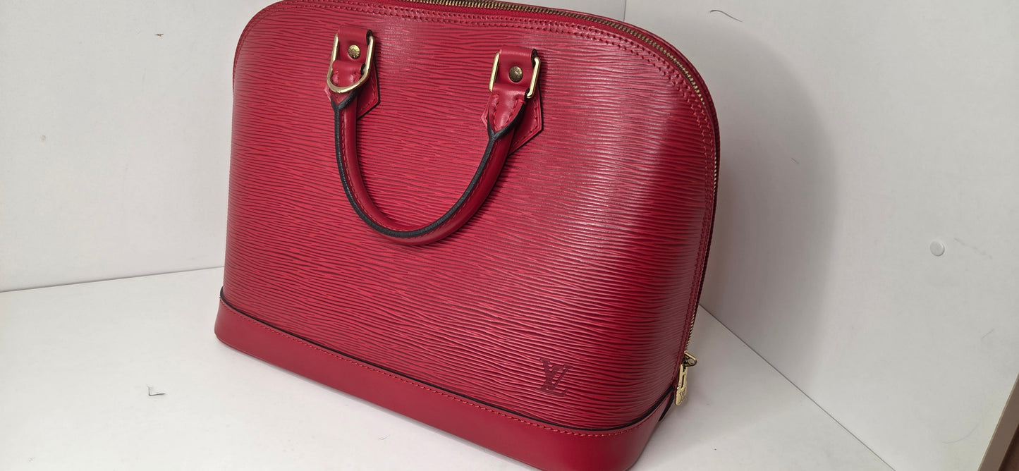 Louis Vuitton Alma PM en excellent état