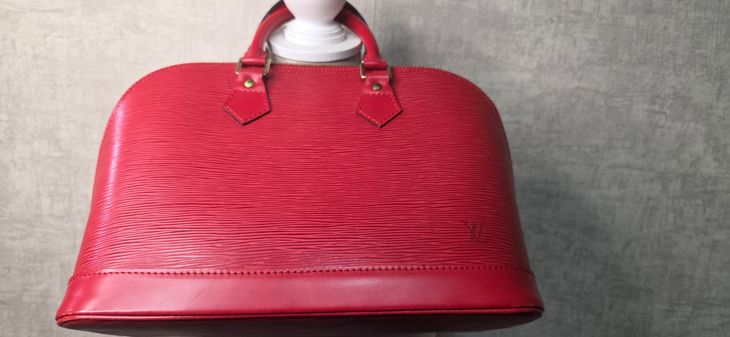 Louis Vuitton Alma PM en excellent état
