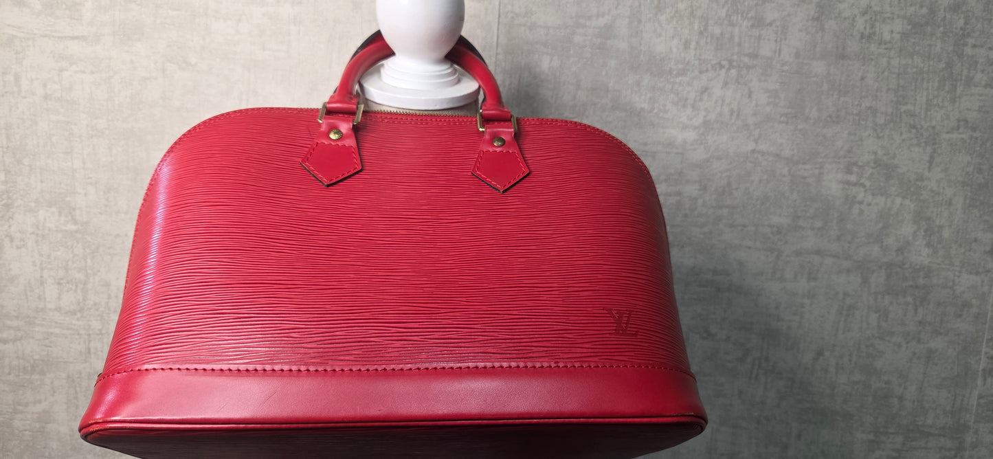 Louis Vuitton Alma PM en excellent état