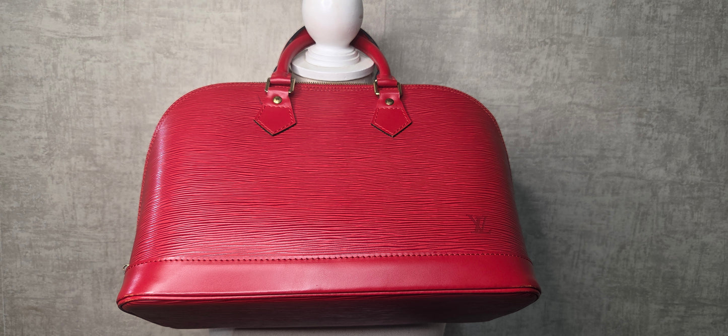 Louis Vuitton Alma PM en excellent état