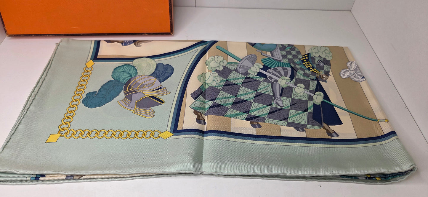 Carré Hermès intitulé Chocs en Plumes