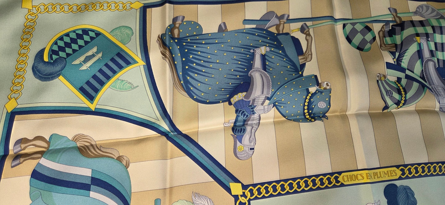 Carré Hermès intitulé Chocs en Plumes