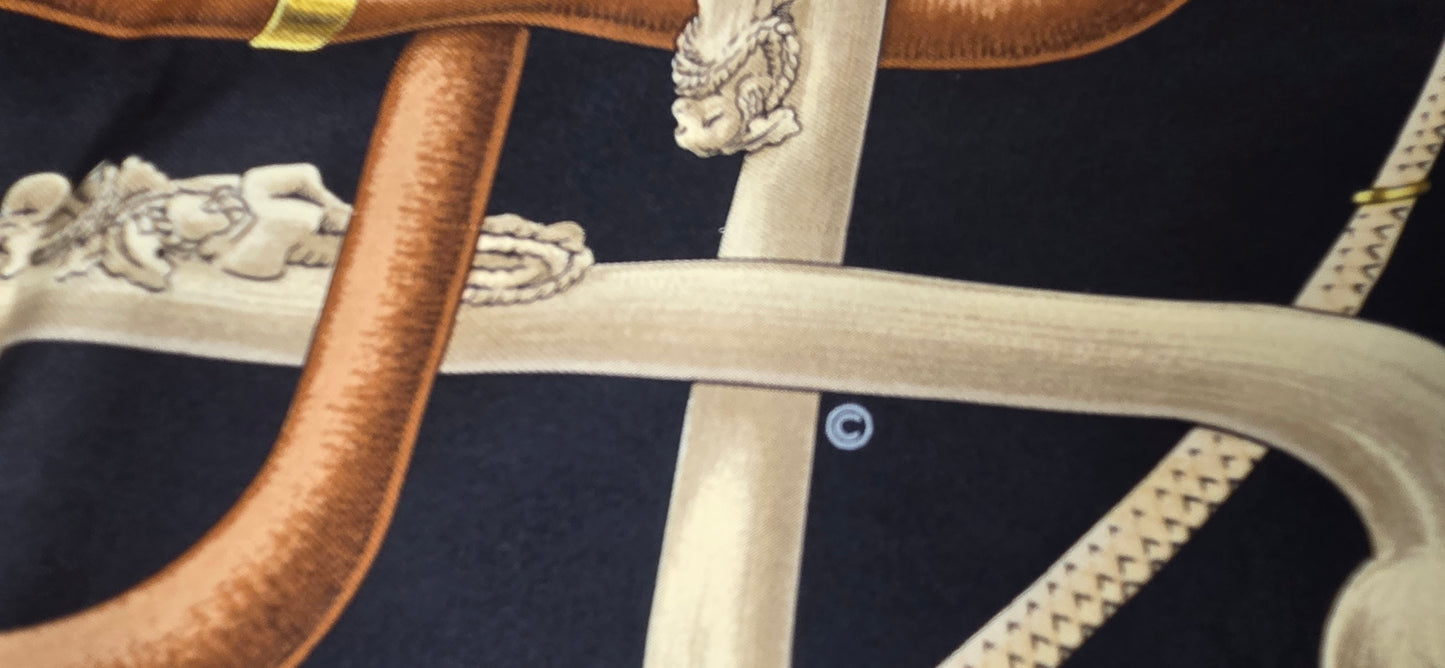 Carré Hermès en twill de soie intitulé "Cannes et Pommeaux "